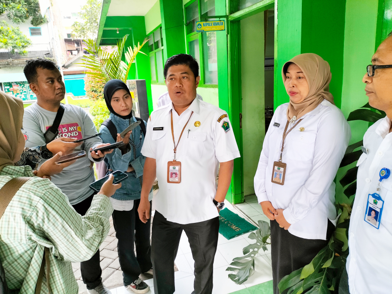 Kepala Dinas Pendidikan dan Kebudayaan Kota Malang Suwarjana menjelaskan kesiapan program makan bergizi gratis. Foto: Tugusatu/Bagus Suryo