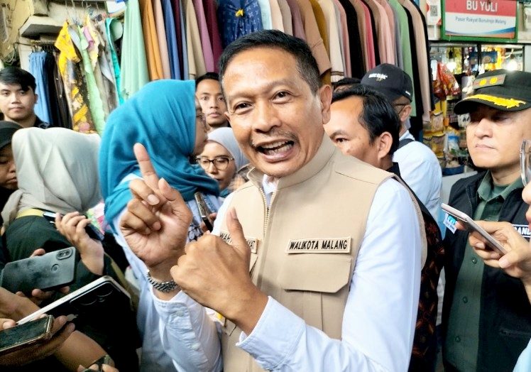 Wali Kota Malang Wahyu Hidayat berkomitmen merealisasikan BPJS Ketenagakerjaan untuk pekerja rentan. Foto: Tugusatu/Bagus Suryo