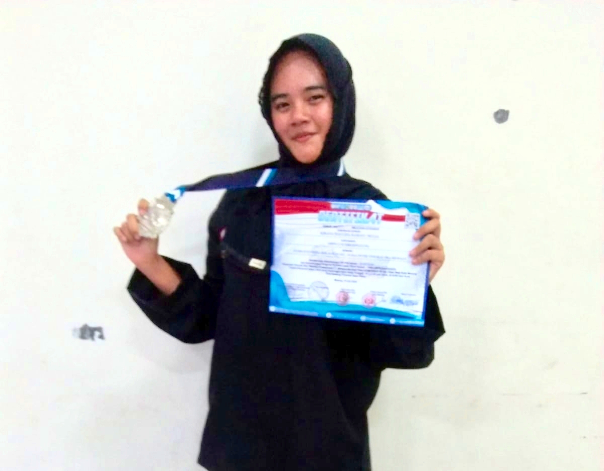 Kirana Maulida, peraih medali perak Tanding Pra Remaja Putri Malang Championship 5 tahun 2025.