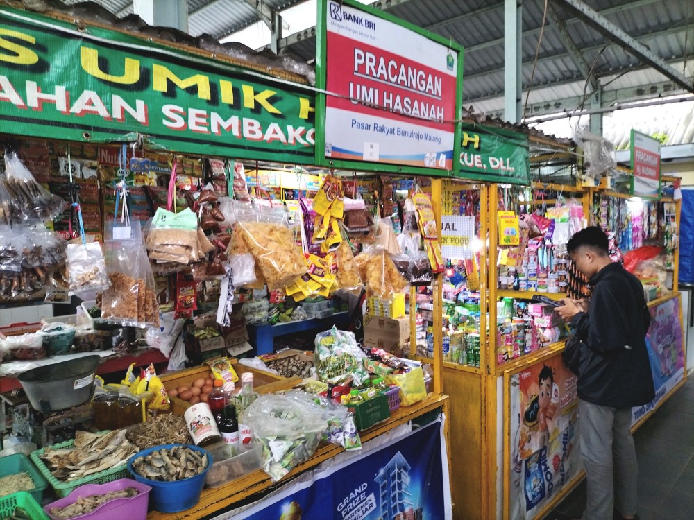 Aktivitas di Pasar Bunulrejo, Kota Malang, Jawa Timur. Foto: Tugusatu/Bagus Suryo