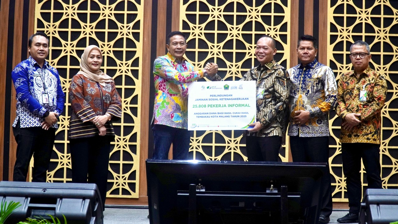 Wali Kota Malang Wahyu Hidayat menyampaikan program yang didanai DBHCT untuk perlindungan jaminan sosial ketenagakerjaan bagi para pekerja informal dan rentan. Foto: Dok. Diskominfo Kota Malang